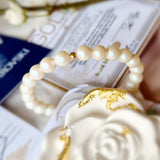 луксозен подарък за бебе, луксозни подаръци за бебе, гривна с перли и злато